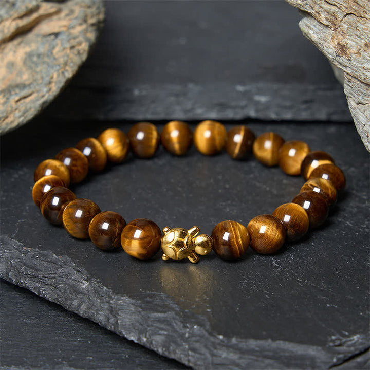 Buddha Stones Accessoires met natuurlijke tijgeroogkralen en schildpadmotief - 8mm tijgeroog (Polsomtrek: 15-16 cm) - image 9