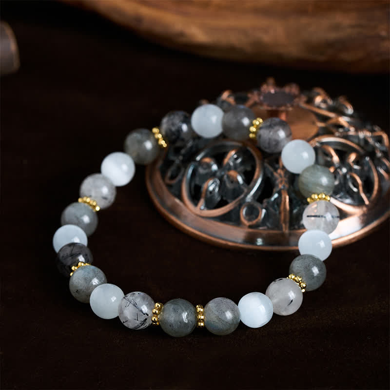 Buddha Stones Armband met witte kattenoog, maansteen en zwarte rutielkwarts kralen, symbool voor overvloed. - image 1