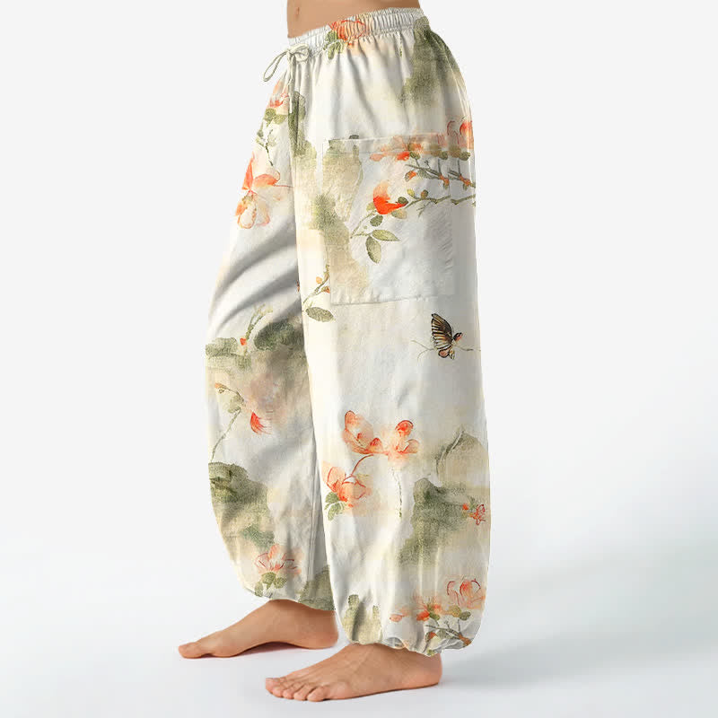 Buddha Stones Dames harembroek met elastische Taille en Zakken , bedrukt met een katoenen aquarel bloemen- en vlinderpatroon. - image 1