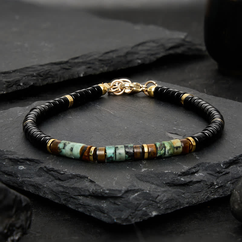 Buddha Stones Beschermende ronde Armband van zwarte onyx en turkoois - image 1