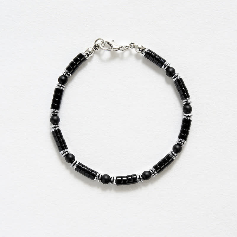 Buddha Stones Armband met cilindrische, matte zwarte onyx tussenkraaltjes - image 4