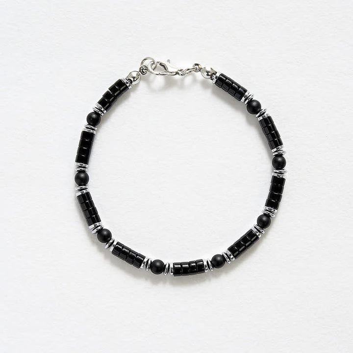 Buddha Stones Armband met cilindrische, matte zwarte onyx tussenkraaltjes - image 4