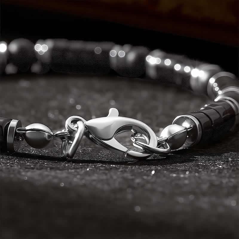 Buddha Stones Armband met cilindrische, matte zwarte onyx tussenkraaltjes - image 5