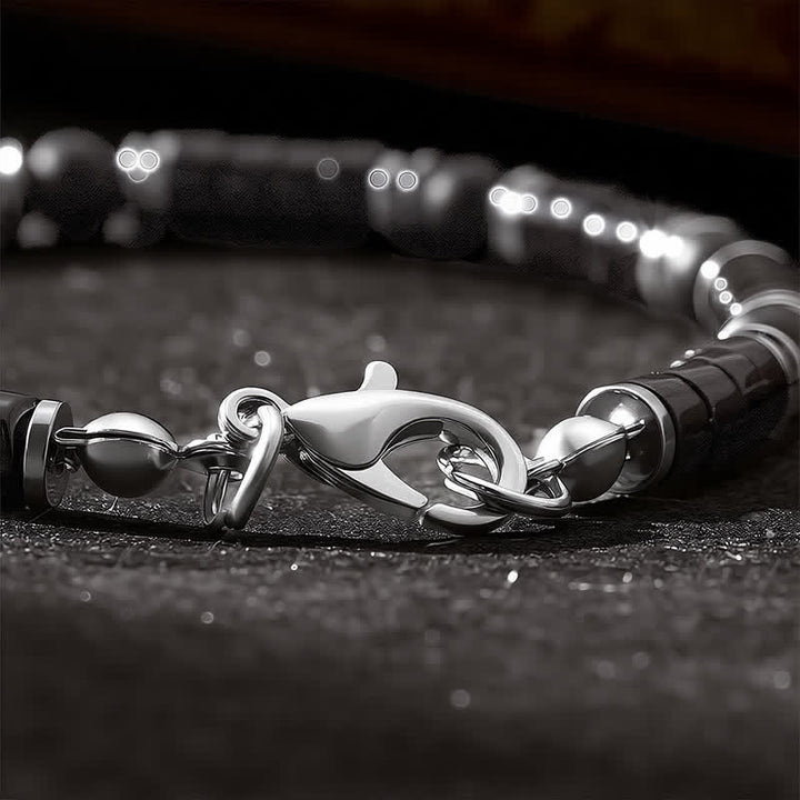 Buddha Stones Armband met cilindrische, matte zwarte onyx tussenkraaltjes - image 5