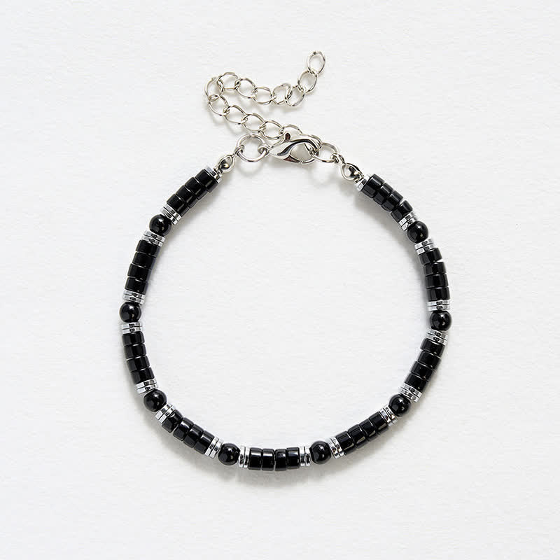 Buddha Stones Armband met cilindrische, matte zwarte onyx tussenkraaltjes - image 12