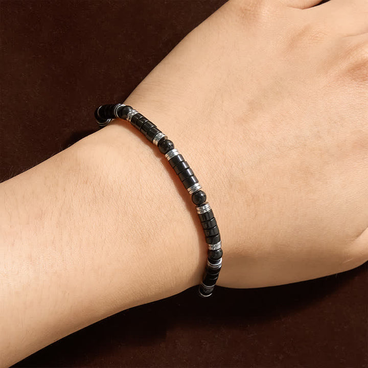 Buddha Stones Armband met cilindrische, matte zwarte onyx tussenkraaltjes - image 3