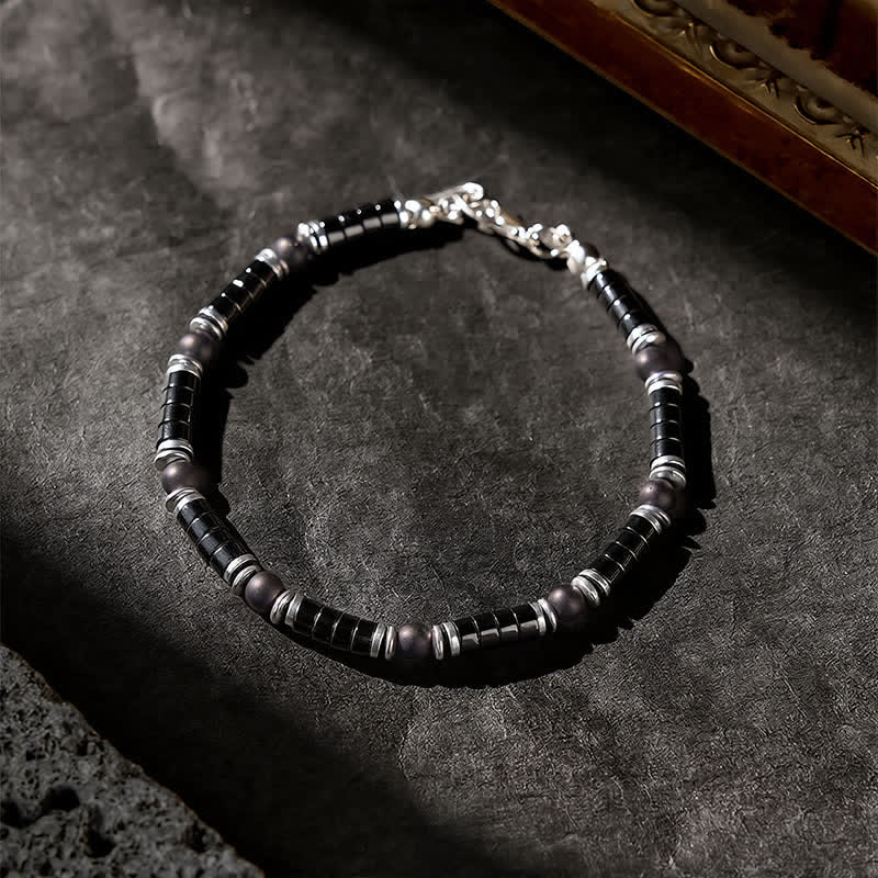 Buddha Stones Armband met cilindrische, matte zwarte onyx tussenkraaltjes - image 2