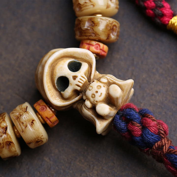 Buddha Stones Tibetaanse bottenkralen Armband ter bescherming van de Heer van het Lijkenbos - image 1
