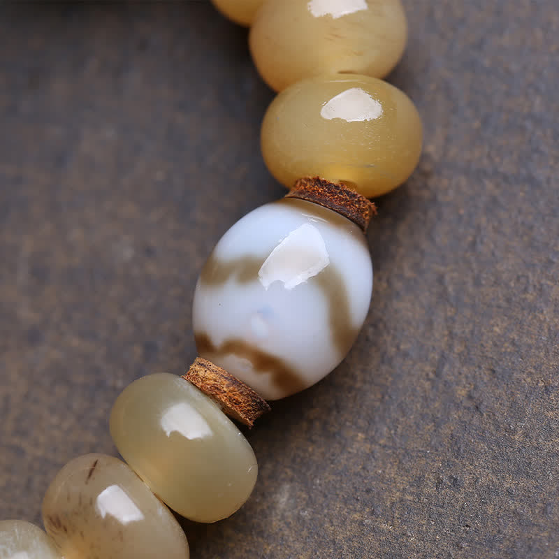 Buddha Stones Botkraal Dzi-kraal Heer van het Lijk Bos Bescherming Tibetaanse Armband - image 1
