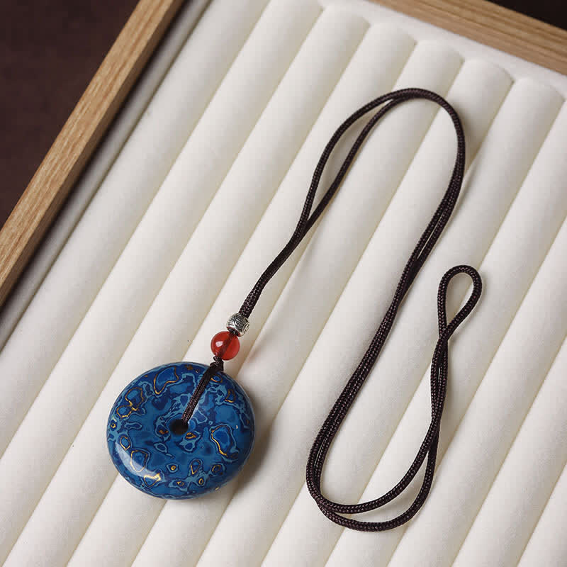 Buddha Stones Halsketting met vredesgesp en gevlochten Ketting - Blauw kleurenschema met willekeurig patroon - image 1