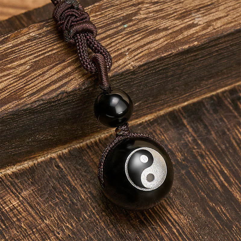 Buddha Stones Zwarte obsidiaan hanger voor zuivering, symbool van Yin Yang - image 1