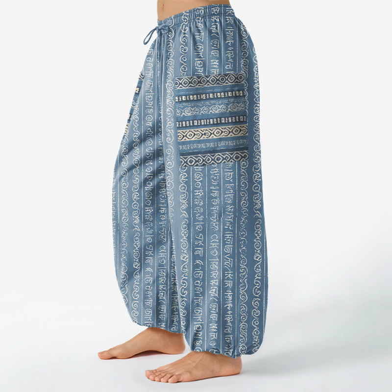 Buddha Stones Dames harembroek met elastische Taille en Zakken , gemaakt van katoen met een etnisch geometrisch streepmotief. - image 1