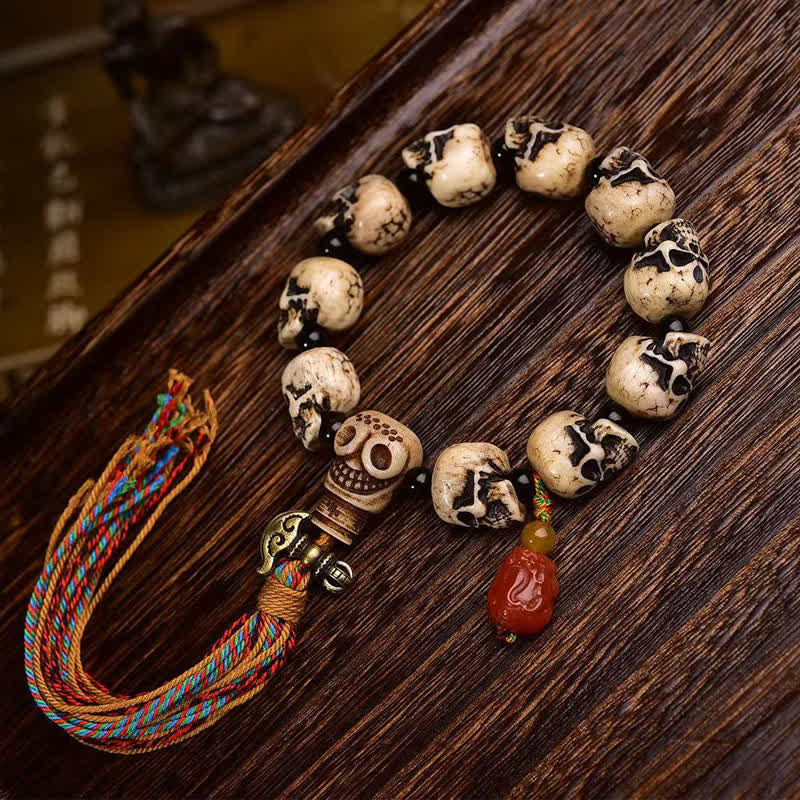 Buddha Stones Tibetaanse handgesneden bottenkraal met patroon van de Heer van het Lijkenbos Armband - 22 × 14 × 13 mm - image 0