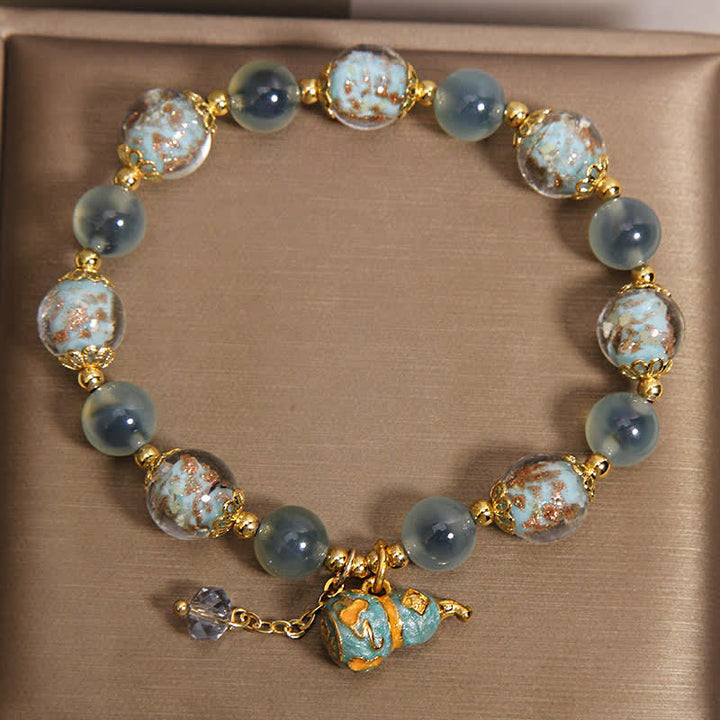 Buddha Stones Blauwe snoepagaat Liuli glazen kalebas bedeltje Joy Armband - image 1