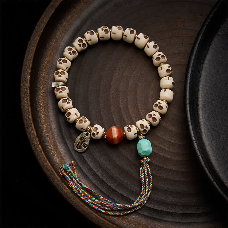 Buddha Stones Tibetaanse bottenkralen Armband met schedelpatroon van de Heer van het Lijkenbos. - 9 × 6,3 mm - image 0