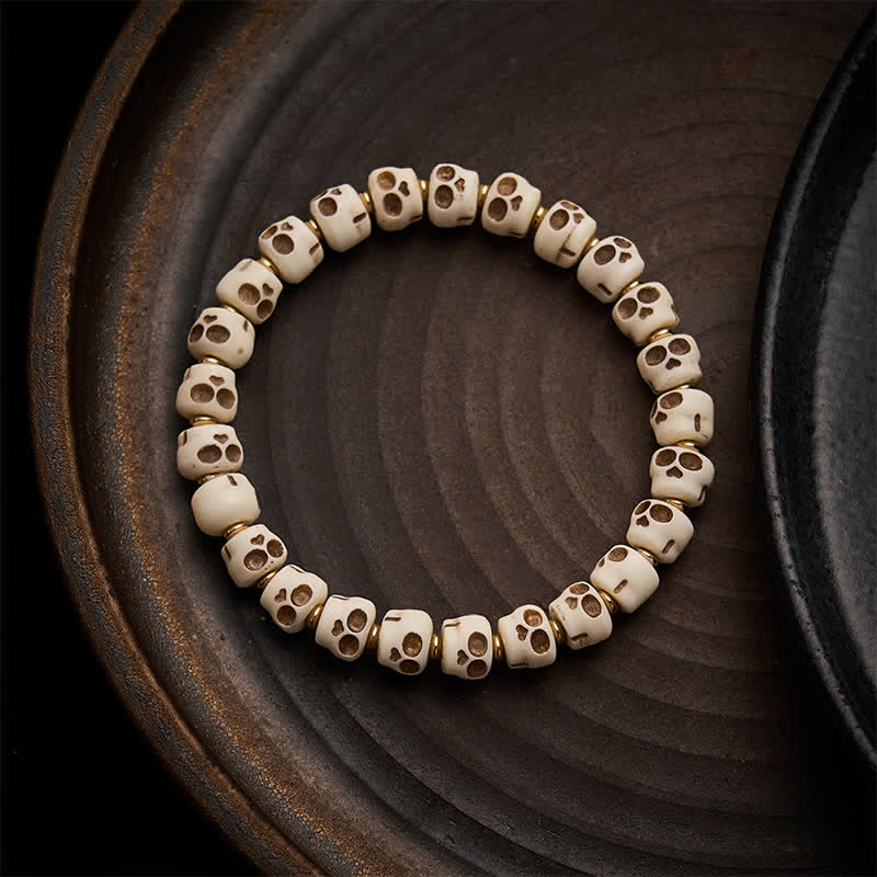 Buddha Stones Tibetaanse bottenkralen armband met schedelpatroon van de Heer van het Lijkenbos voor bescherming en moed . - 9 × 6,3 mm - image 0