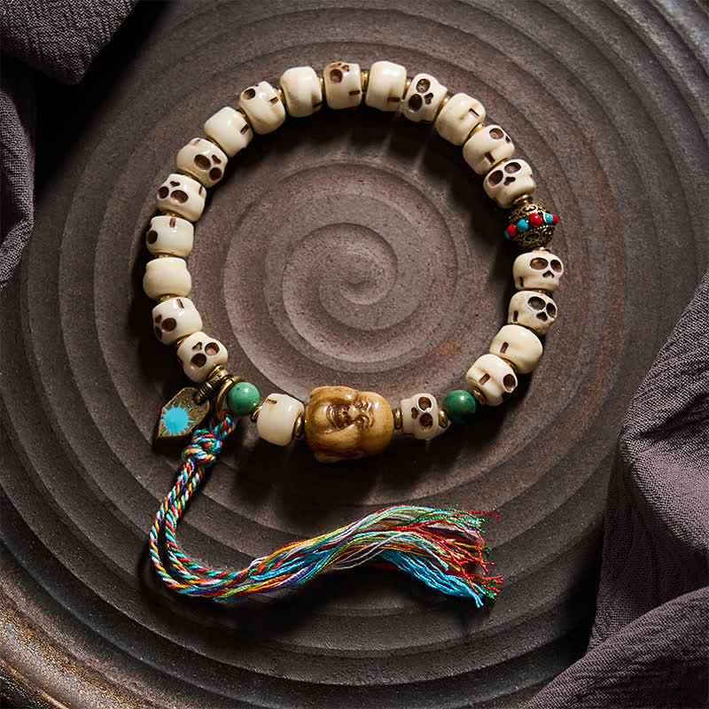 Buddha Stones Tibetaanse bottenkralen Heer van het Lijkenbos Schedelpatroon Armband voor Kracht en Verandering - image 1