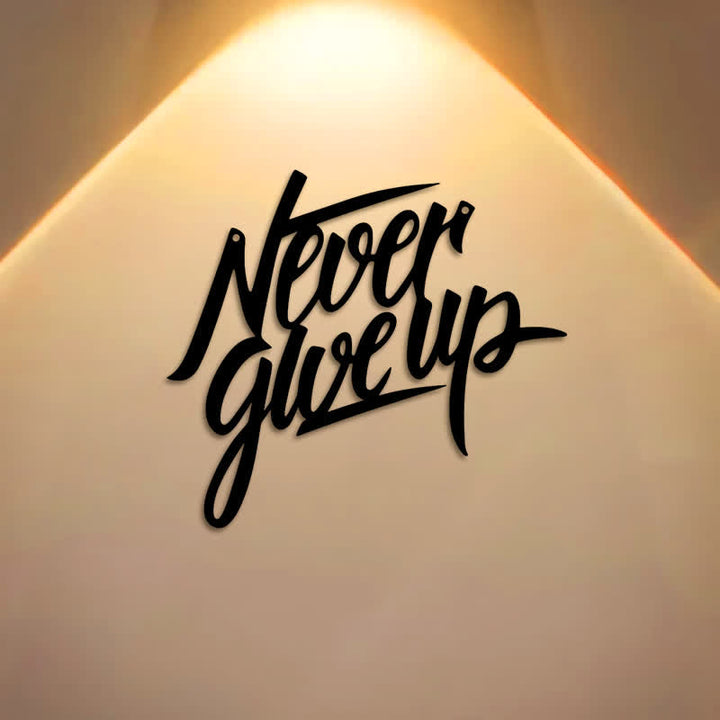 Buddha Stones "Never Give Up" Zwarte tekst ijzeren metalen wanddecoratie - image 0