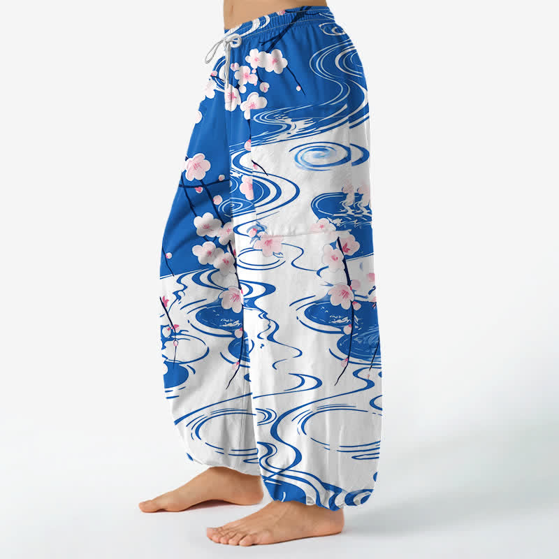 Buddha Stones Dames harembroek met elastische Taille en Zakken , met katoenen patroon van kersenbloesems en waterrimpels. - image 1