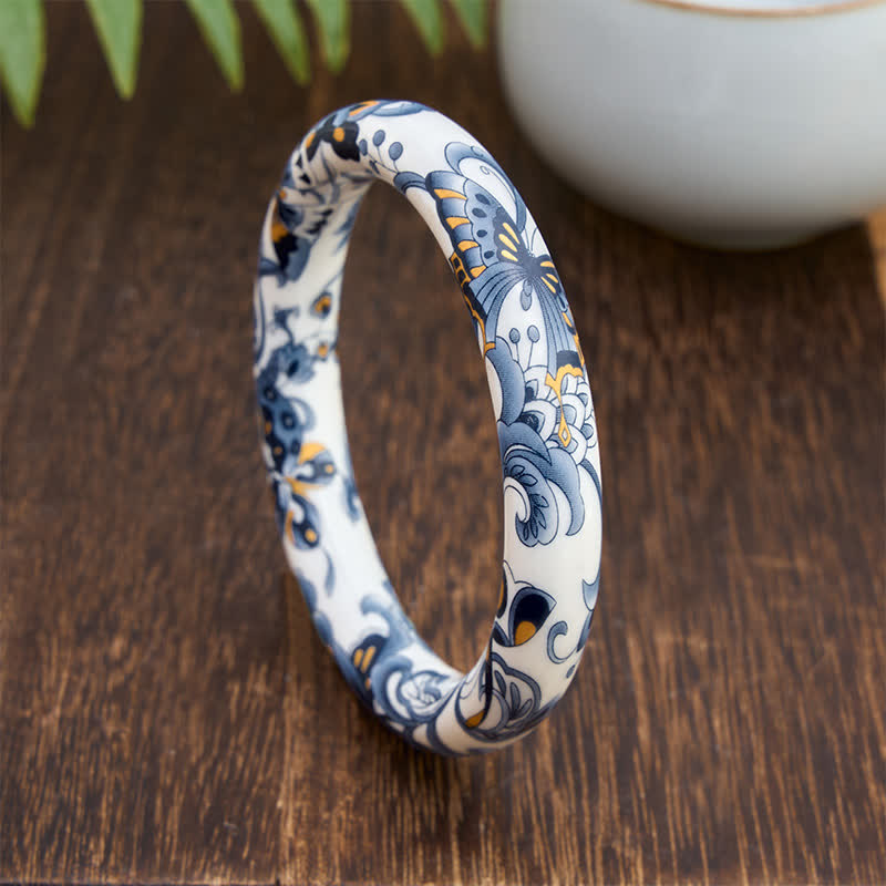 Buddha Stones Keramische vlinderarmband met handgeschilderd vrijheidsmotief . - image 1