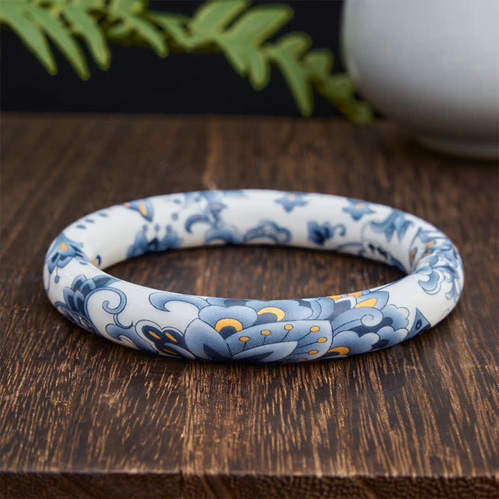 Buddha Stones Keramische vlinderarmband met handgeschilderd vrijheidsmotief . - Ronde - image 0