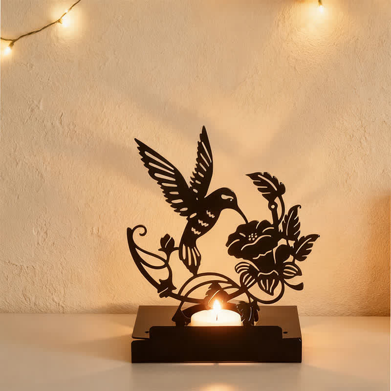 Buddha Stones Zwarte ijzeren kaarsenhouder met silhouet van een vogel en een olifant. - image 1