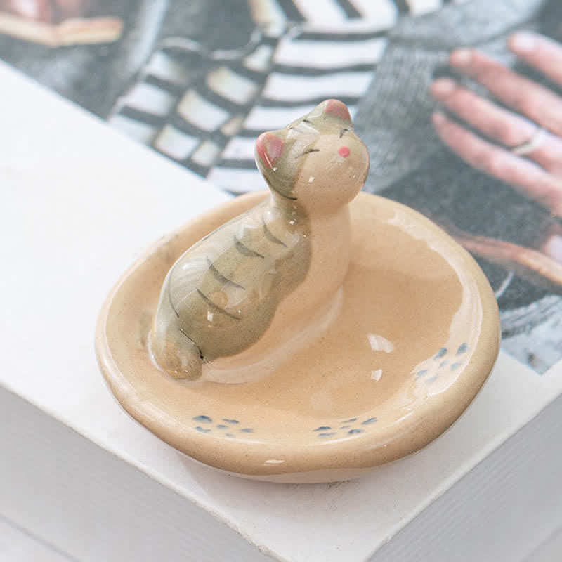 Buddha Stones Japanse stijl, handbeschilderde keramische eetstokjeshouder in de vorm van een slapende oranje kat - image 0
