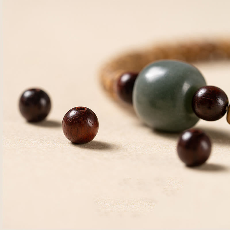 Buddha Stones Armband van Bodhizaad, kleine blaadjes en rood sandelhout. - image 5