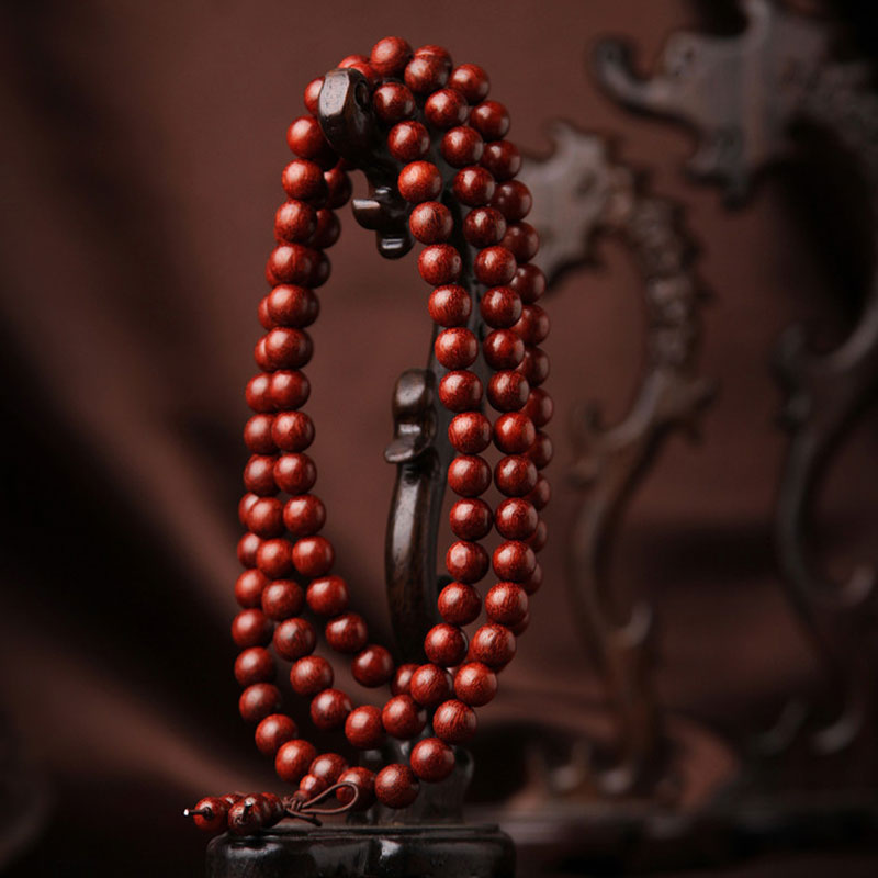 Buddha Stones Tibetaanse Mala - Armband met 108 kralen van rood sandelhout met kleine blaadjes. - image 1