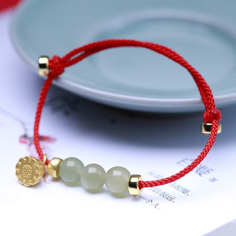 Buddha Stones Armband van natuurlijk jade, lotuszaad en rood koord. - Rood (Polsomtrek 14-20 cm) - image 2