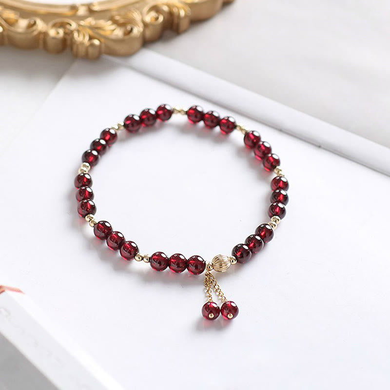 Buddha Stones 14K vergulde legering armband met natuurlijke granaat - image 1