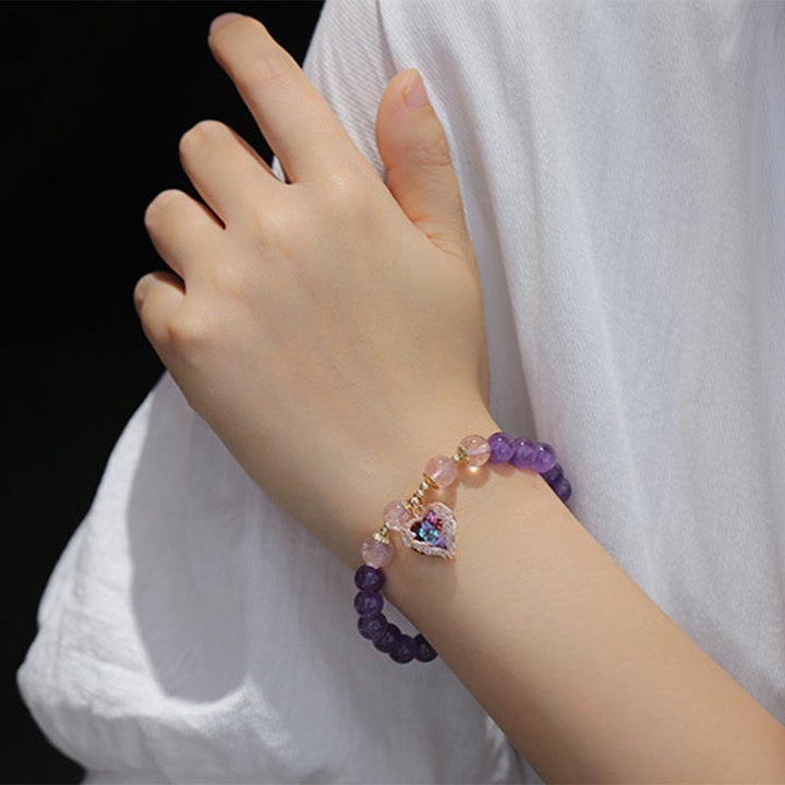 Armband van natuurlijke amethist en aardbeikwarts. - image 3