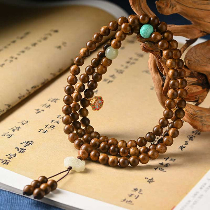 Buddha Stones Tibetaanse rozenhouten beschermende kalmerende Armband (Mala) - image 0