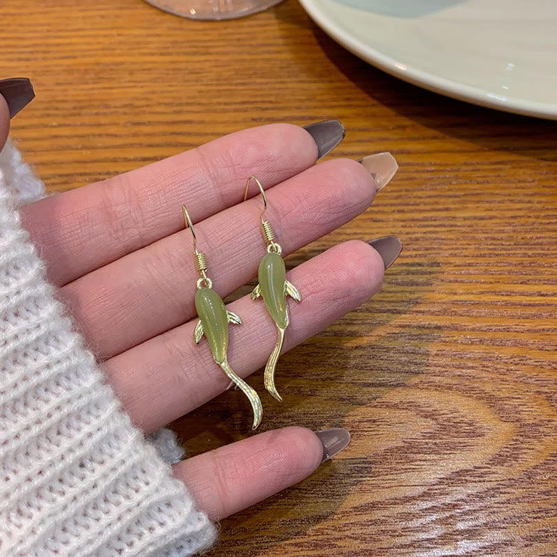 Oorbellen met vismotief en jade, die geluk brengen. - image 12