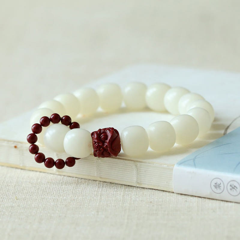 Buddha Stones Natuurlijke Bodhizaad Cinnaber Dansende Leeuw Amulet Wijsheid Harmonie Pols Mala - image 1