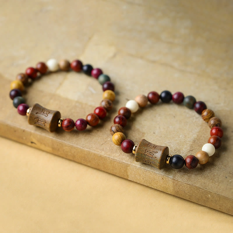 Buddha Stones Tibetaanse veelkleurige sandelhouten Om Mani Padme Hum Armband - image 1