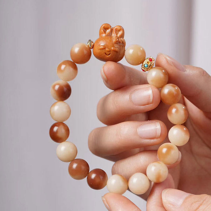Buddha Stones Natuurlijke Bodhizaadjes Liefdevol Konijn Armband - Bodhizaad (Wijsheid♥Ontwaak) (Polsomtrek 14-16 cm) - image 0