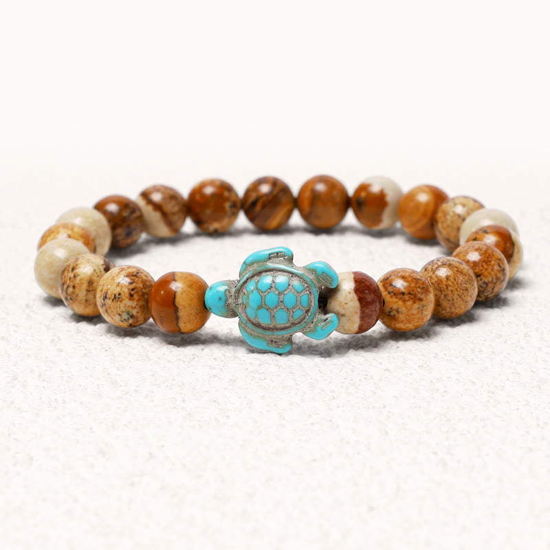 Buddha Stones Armband met natuurstenen afbeelding van een zeeschildpad en turkooizen zegenmotief - Foto Jasper - image 10