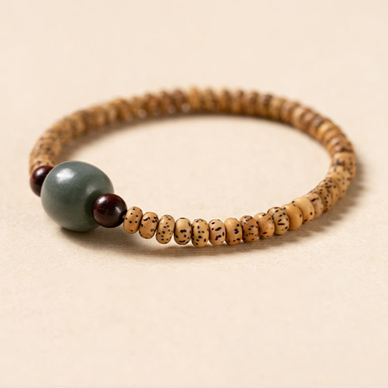 Buddha Stones Armband van Bodhizaad, kleine blaadjes en rood sandelhout. - image 2