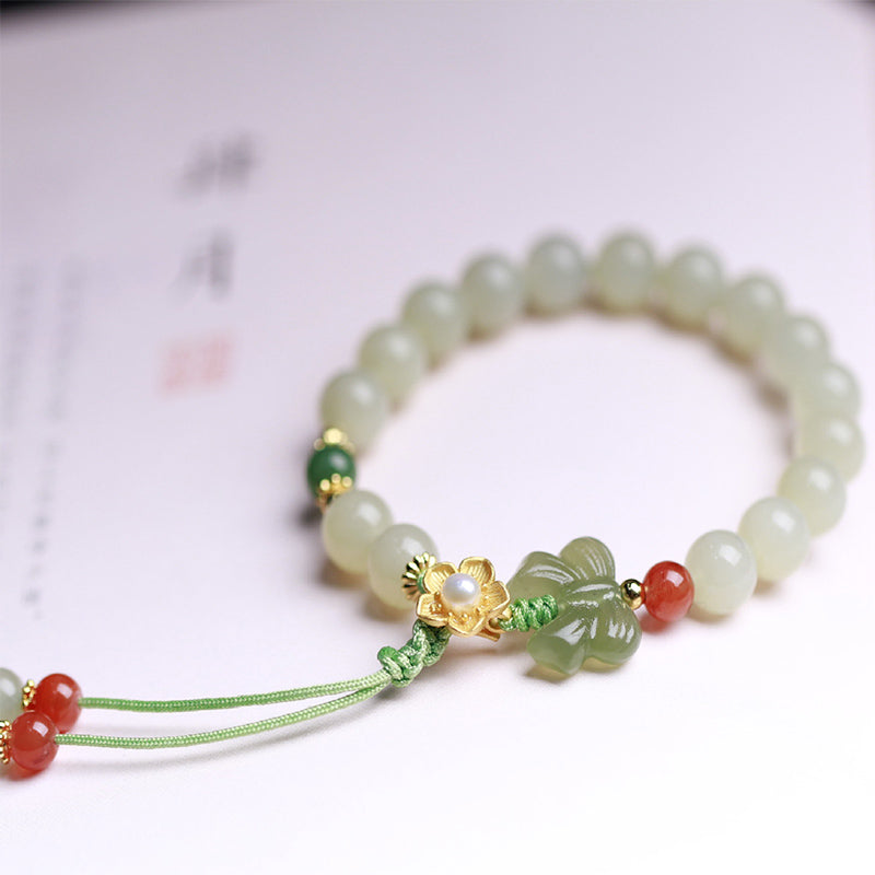 Buddha Stones Armband van 925 sterling zilver met jade, geluksbloem en vlinder. - image 1