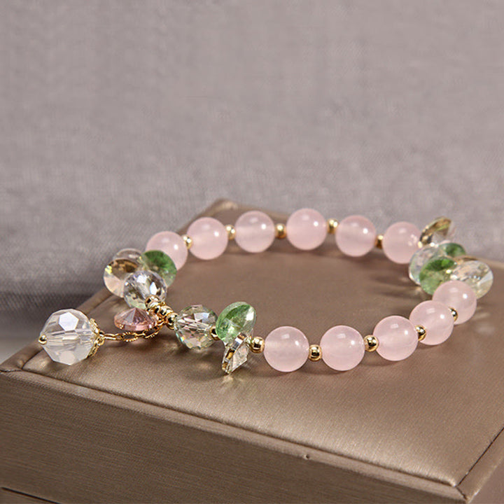 Buddha Stones Armband met vredesbedeltje in de vorm van een kattenoog, roze kristal - image 4