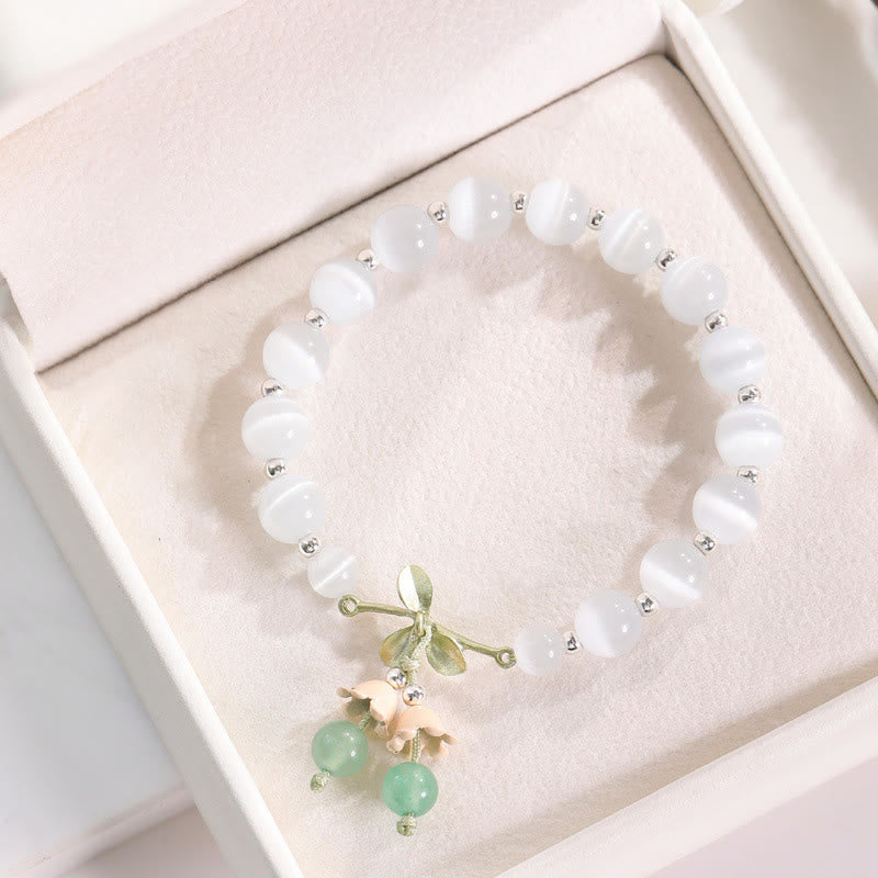 Buddha Stones Armband met bedeltjes van kattenoog, groene aventurijn, blauwe chalcedoon, roze kristal en vredesorchidee. - Kattenoog & Groene Aventurijn - image 0