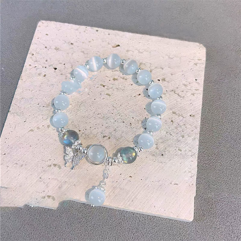 Buddha Stones Armband met bedeltjes van kattenoog, maansteen, vlinder en ster - image 7