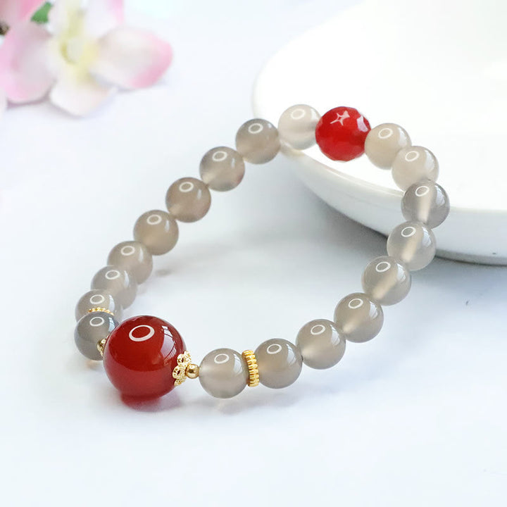 Buddha Stones Armband van natuurlijke grijze chalcedoon en rode agaat - image 4