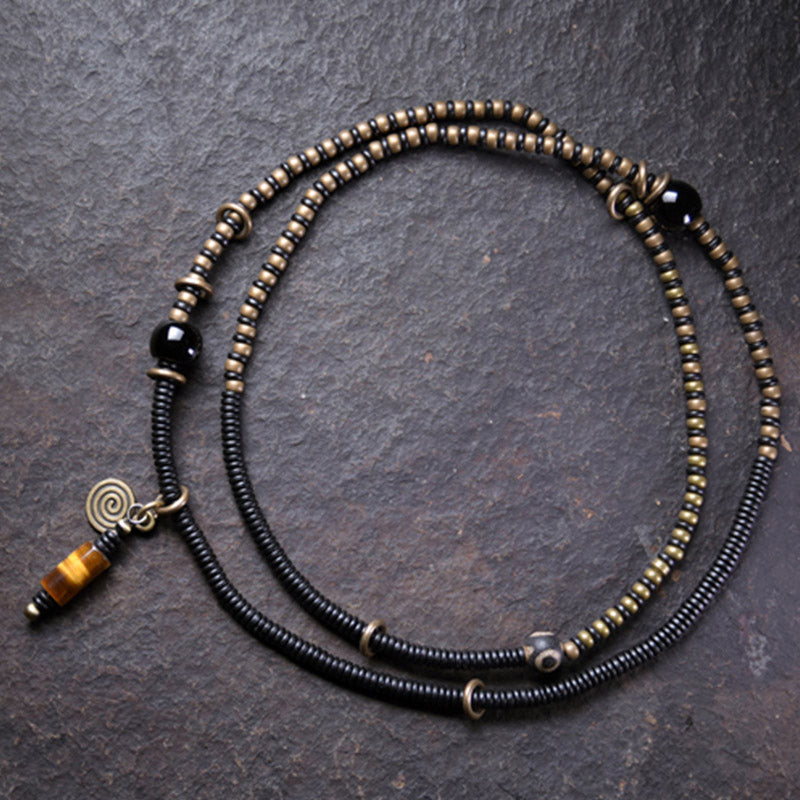 Buddha Stones Ebbenhouten Dzi-kraal, koperen vredesarmband , Armband en Ketting voor een paar - image 1