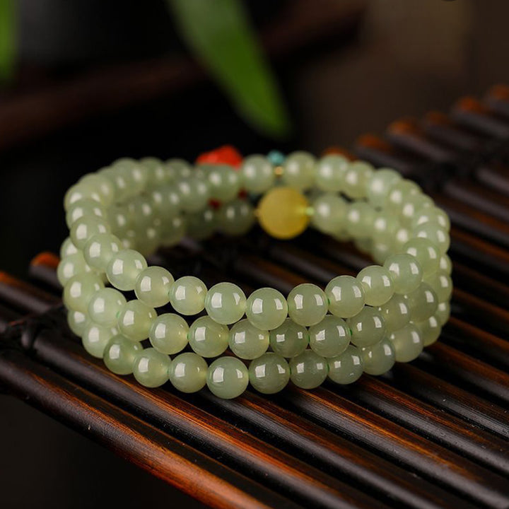 Buddha Stones Armband met lachende Boeddha, symbool van jade, rode agaat en amber. - image 5