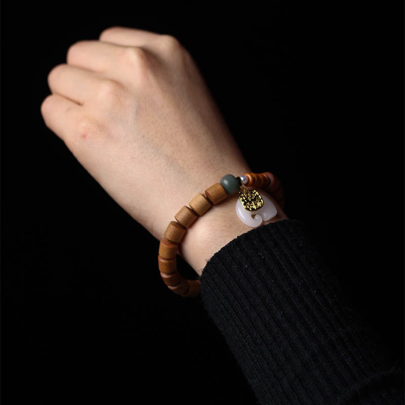 Buddha Stones Armband van sandelhout en jade met olifantje - image 3