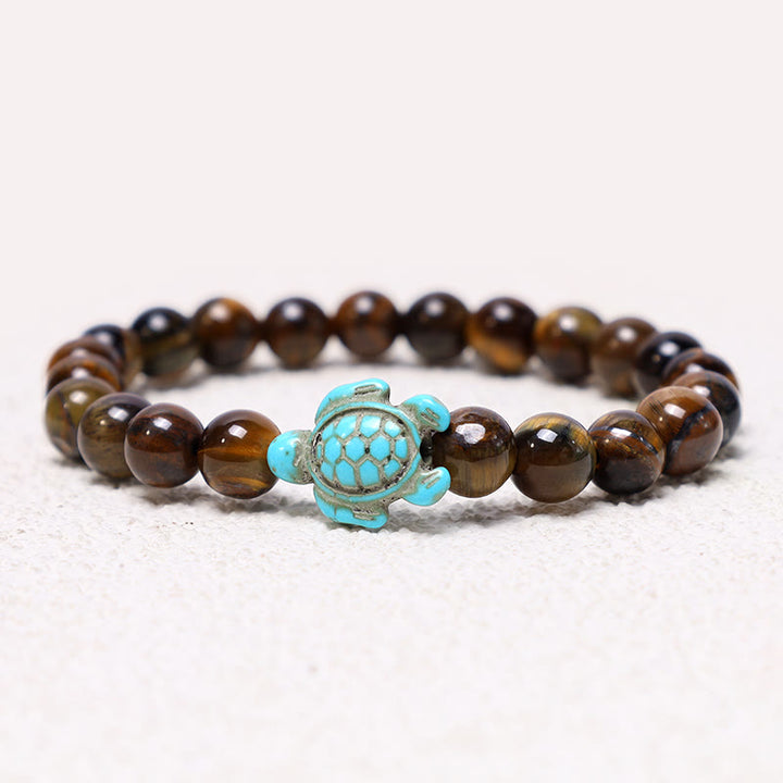 Buddha Stones Armband met natuurstenen afbeelding van een zeeschildpad en turkooizen zegenmotief - Tijgeroog - image 8