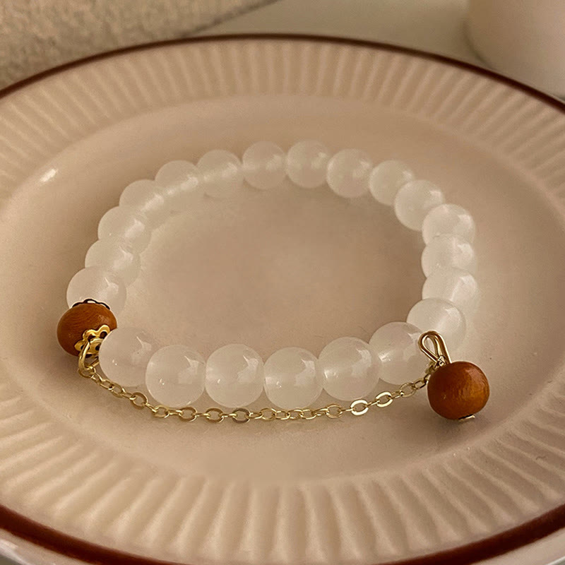 Buddha Stones Armband met bedeltje van sandelhout, kattenoog en Fu-figuur. - Kattenoog Sandelhout - image 9