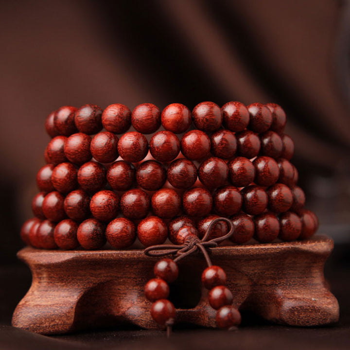 Buddha Stones Tibetaanse Mala - Armband met 108 kralen van rood sandelhout met kleine blaadjes. - image 2